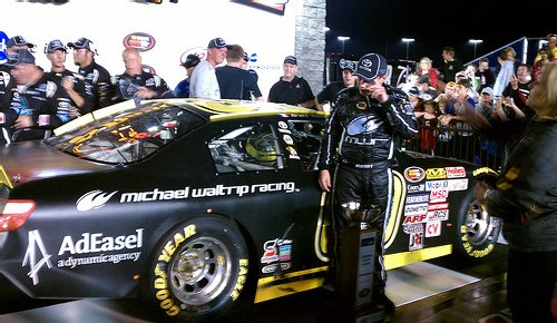 Brett Moffitt stands next to his car in the Winner's Circle at the Iowa Speedway in front of 17,000 hometown fans.
